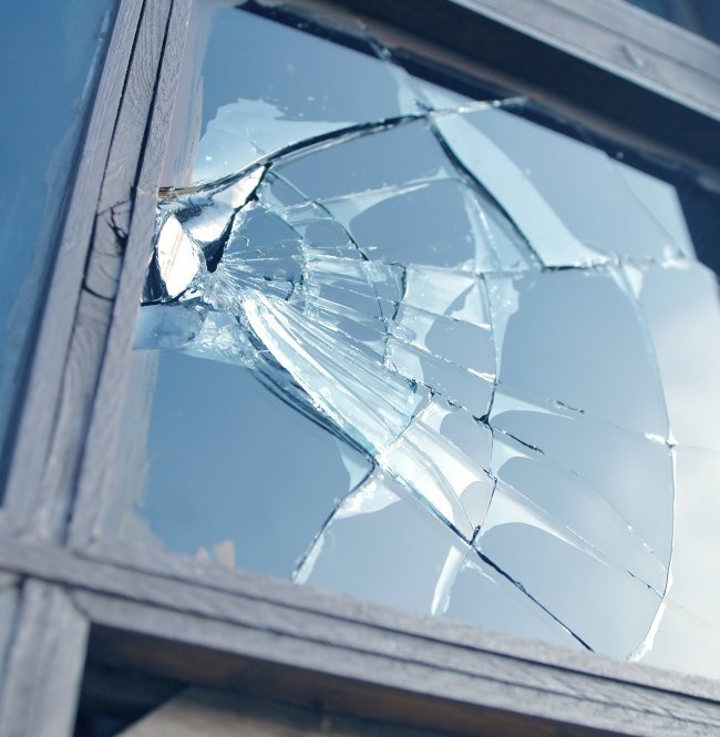 broken window that needs Boarding up in Wakefield